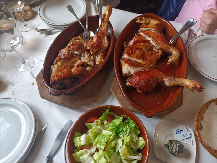 lechal asado en horno de leña